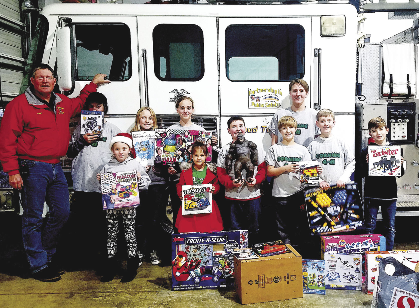 Corning 4-H donates to fire department toy, food drive